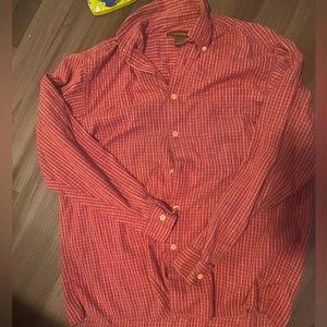 M men's button down shirt. Has a broken button, but there is another button.